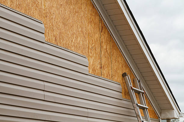 Professional Fiber Cement Siding technician working in Brookline, MA
